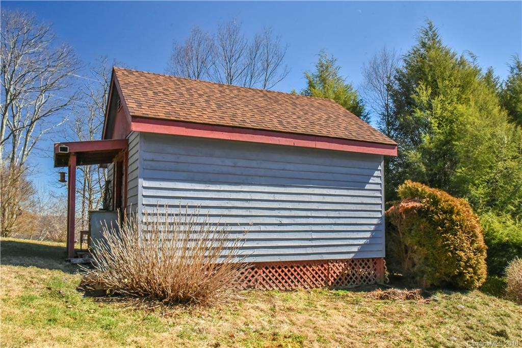 286 Pioneer Ridge Road Canton, NC 28716 - Photo 9 of 33 a view of a house with a yard