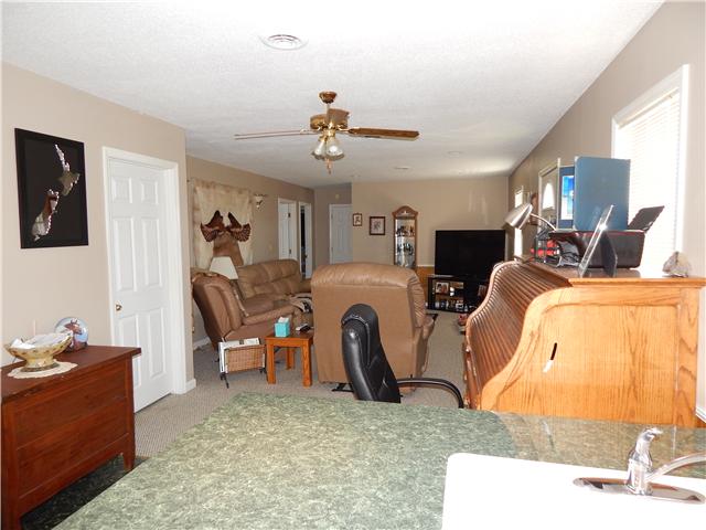25517 Sweet Springs Road Elkmont, AL 35620 - Photo 6 of 18 a view of a room with gym equipment