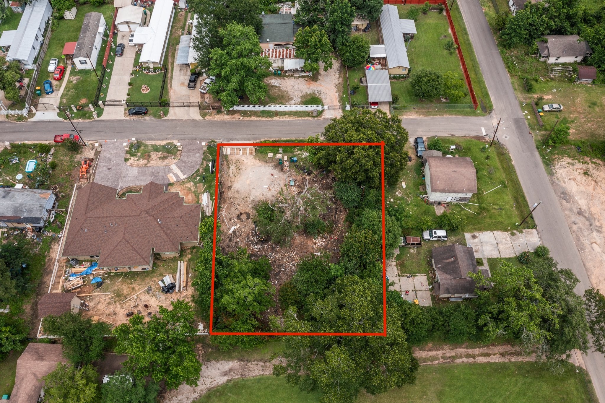 1615 Gilmore Street Conroe, TX 77301 - Photo 11 of 16 an aerial view of multiple houses with yard