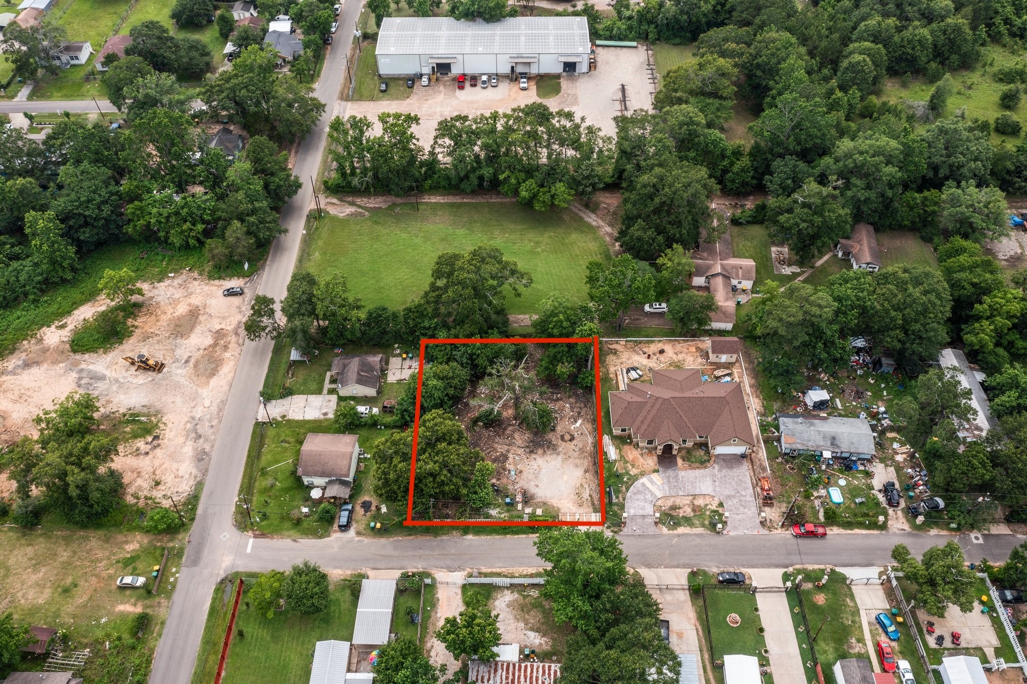 1615 Gilmore Street Conroe, TX 77301 - Photo 12 of 16 an aerial view of residential houses with outdoor space and lake view