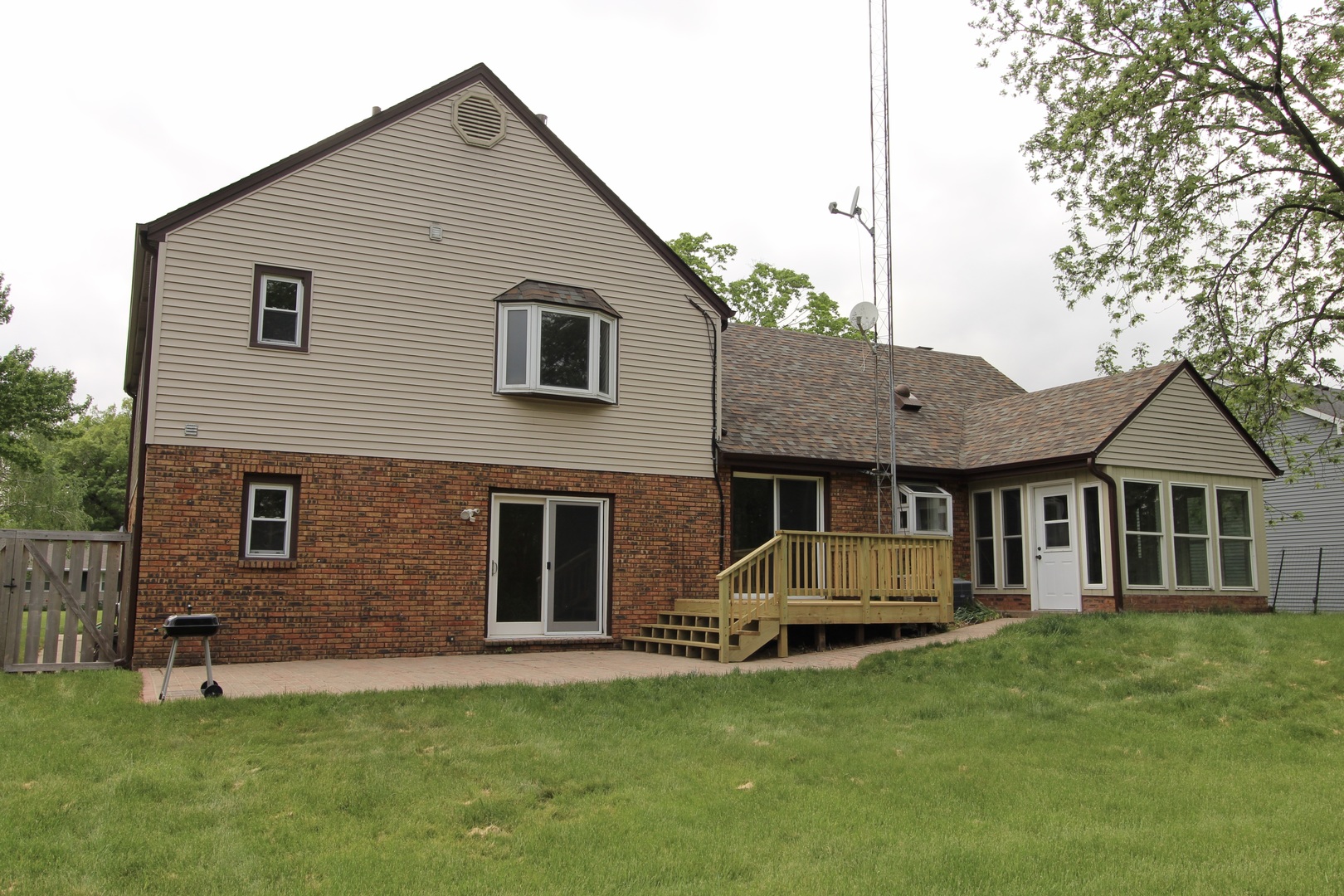 1505 Pheasant Run Road Harvard, IL 60033 - Photo 4 of 30 a view of a house with a backyard