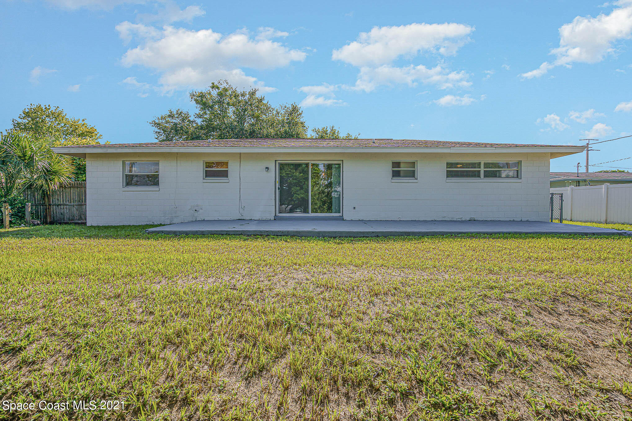 1120 North Carpenter Road Titusville, FL 32796 - Photo 22 of 22 a view of a house with a yard