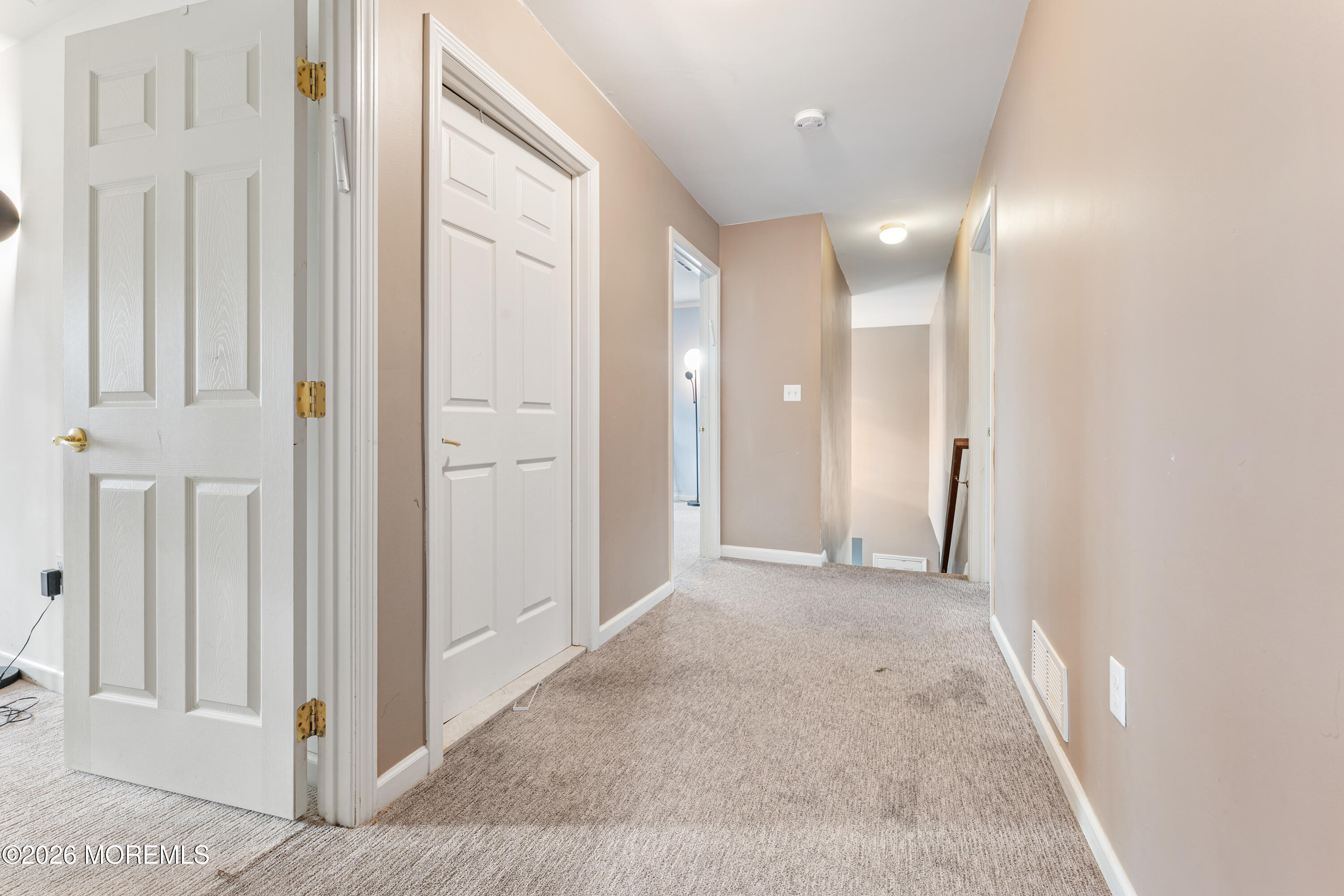 44 Imperial Place North Jackson, NJ 08527 - Photo 17 of 38 a view of a hallway with wooden floor