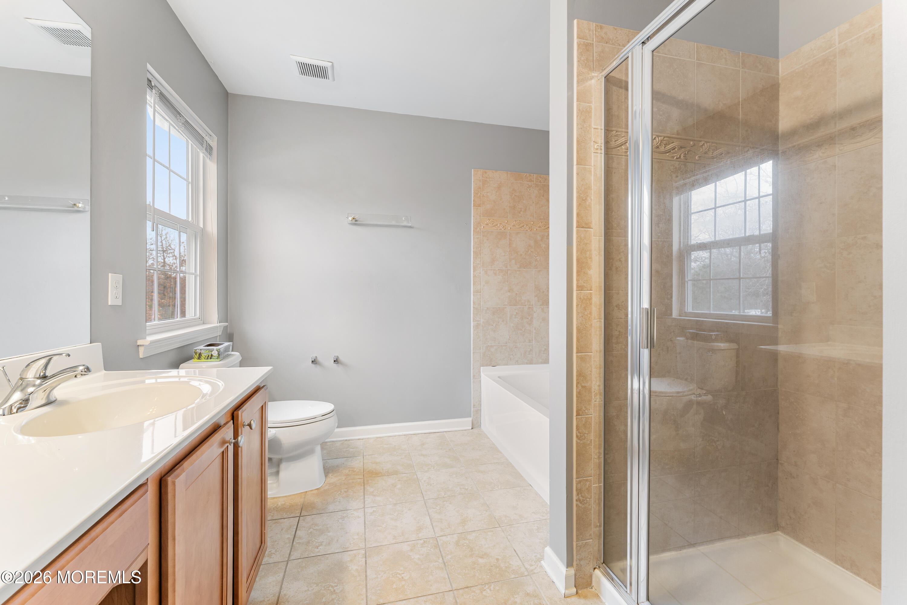 44 Imperial Place North Jackson, NJ 08527 - Photo 23 of 38 a bathroom with a sink a toilet and shower