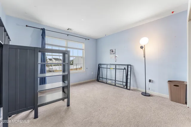 a view of a hallway with closet