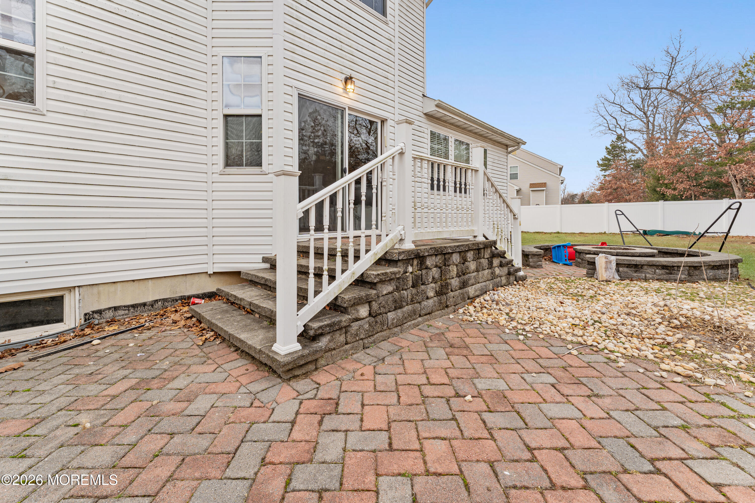 44 Imperial Place North Jackson, NJ 08527 - Photo 26 of 38 a view of a house with a small yard and wooden floor and fence