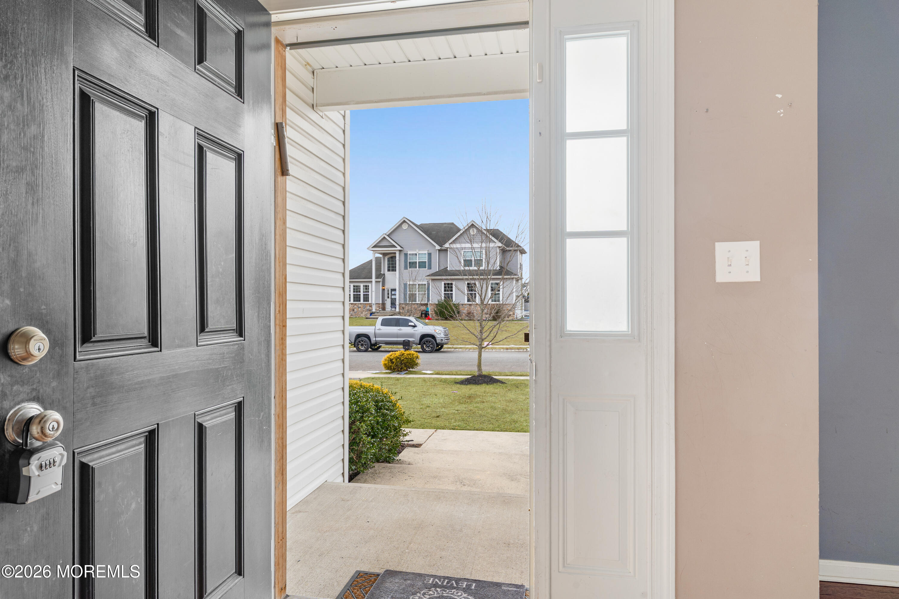 44 Imperial Place North Jackson, NJ 08527 - Photo 5 of 38 a view of livingroom with furniture and front door