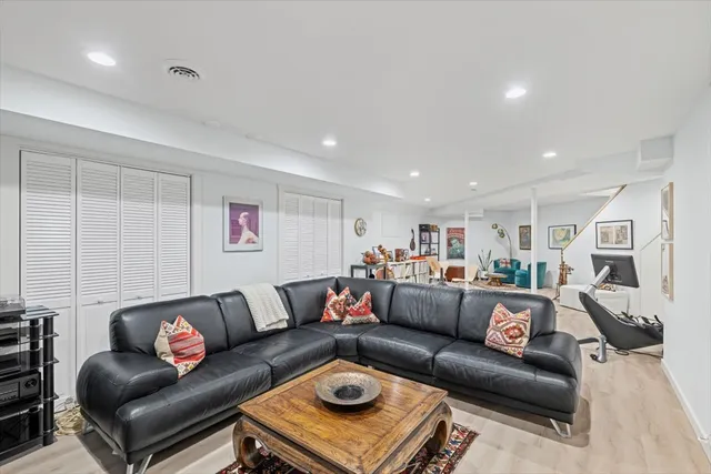 a living room with furniture and a couch