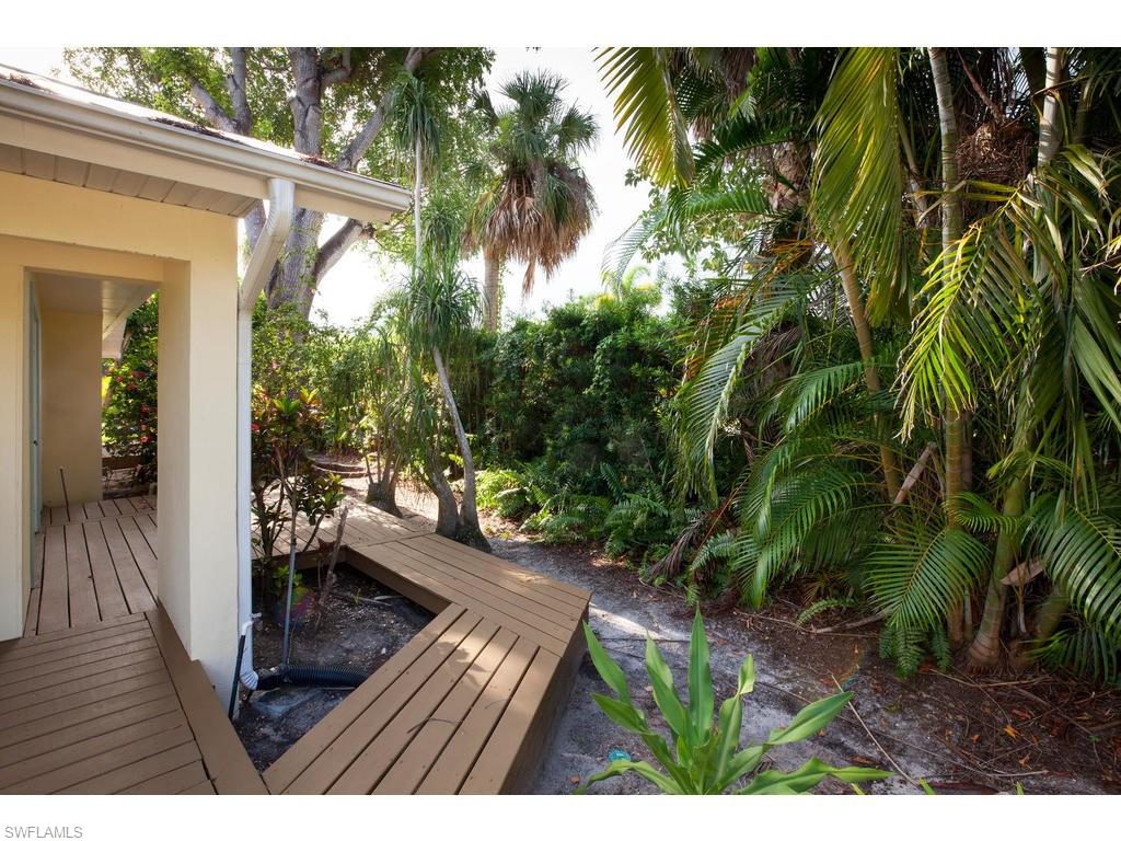641 Palm Circle West Naples, FL 34102 - Photo 12 of 13 a view of outdoor space yard and patio