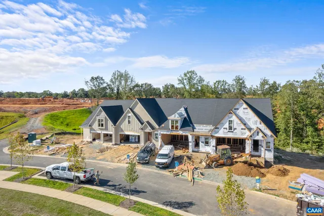 a view of a swimming pool with lounge chair