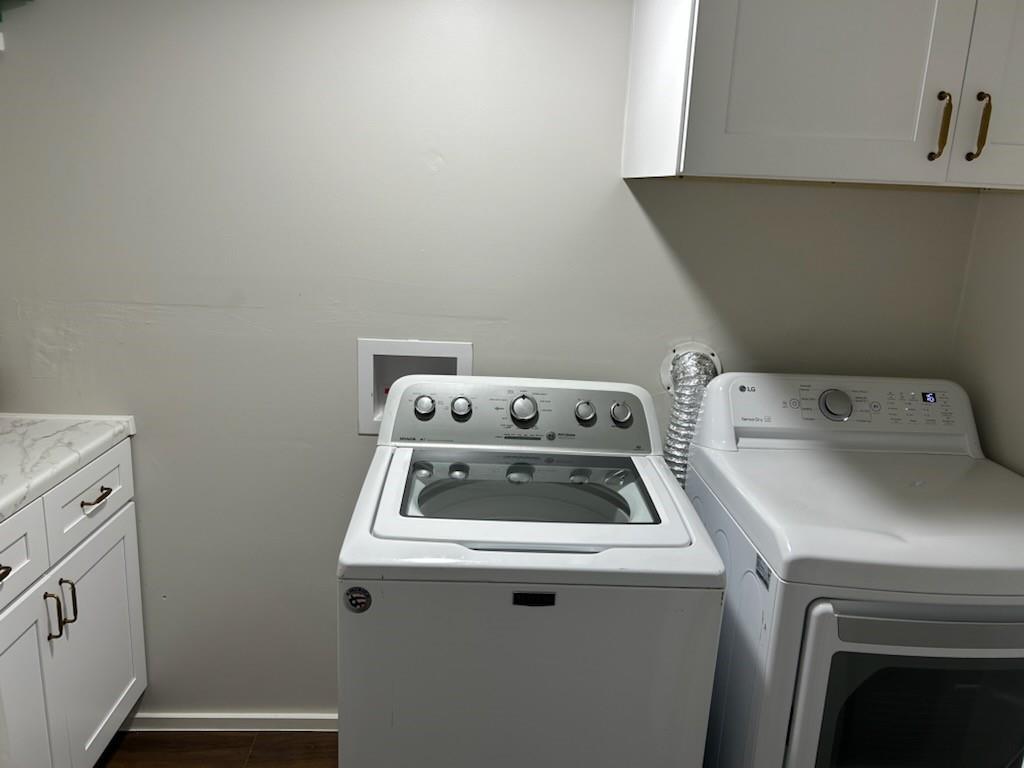 900 West Chestnut Street Denison, TX 75020 - Photo 19 of 22 a utility room with dryer and washer