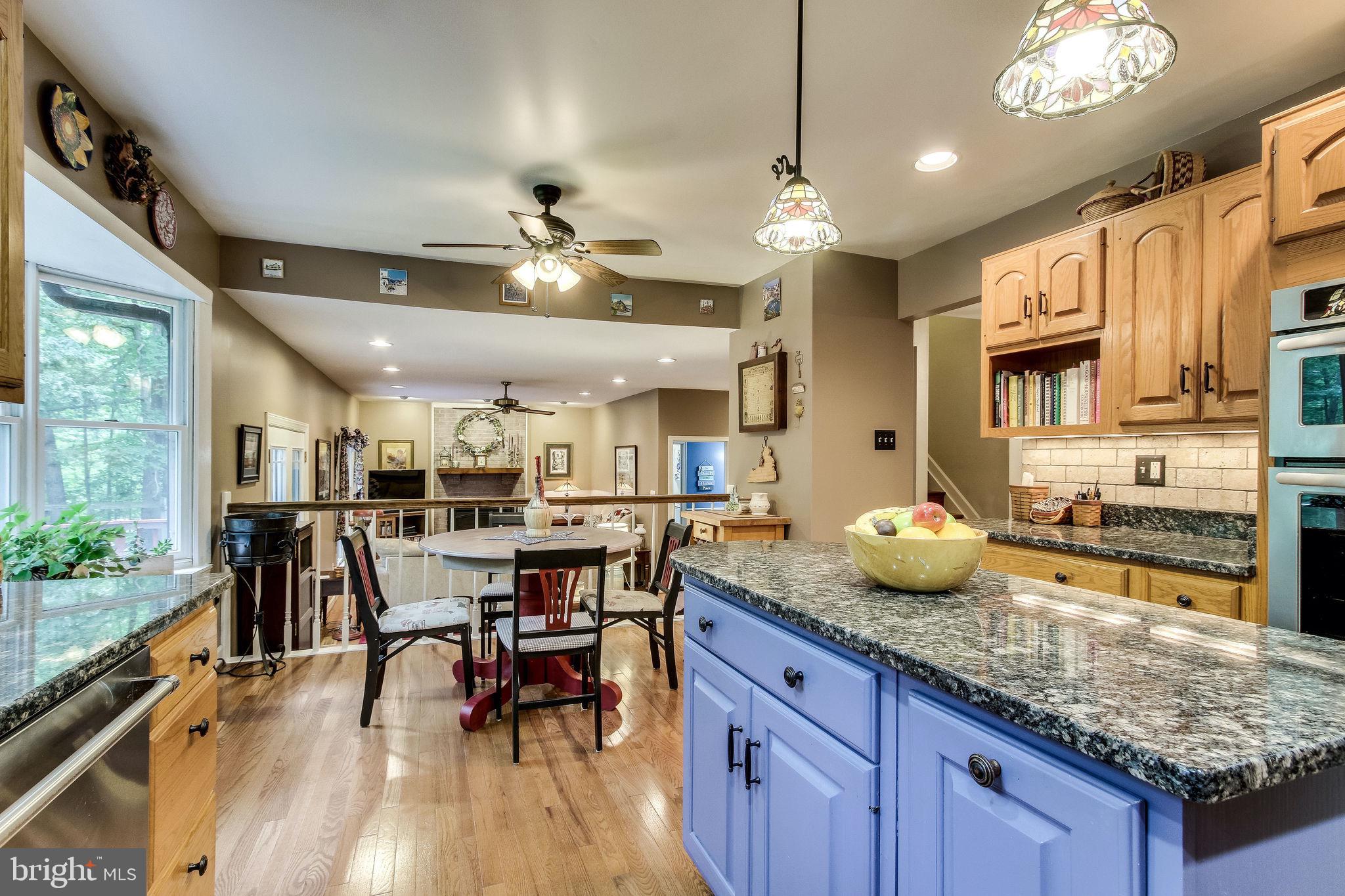 7213 Clifton Road Clifton, VA 20124 - Photo 13 of 53 Kitchen open to family room