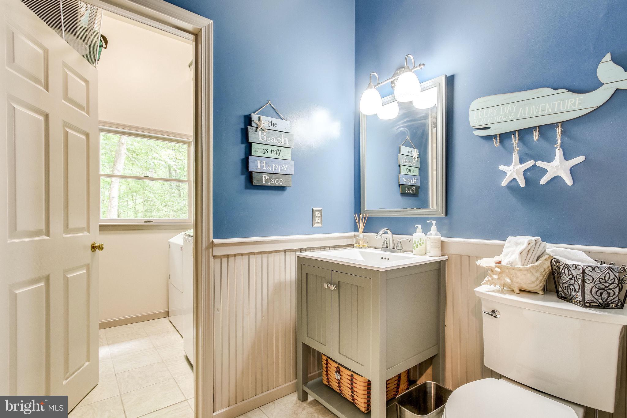 7213 Clifton Road Clifton, VA 20124 - Photo 21 of 53 Main level half bath and laundry room