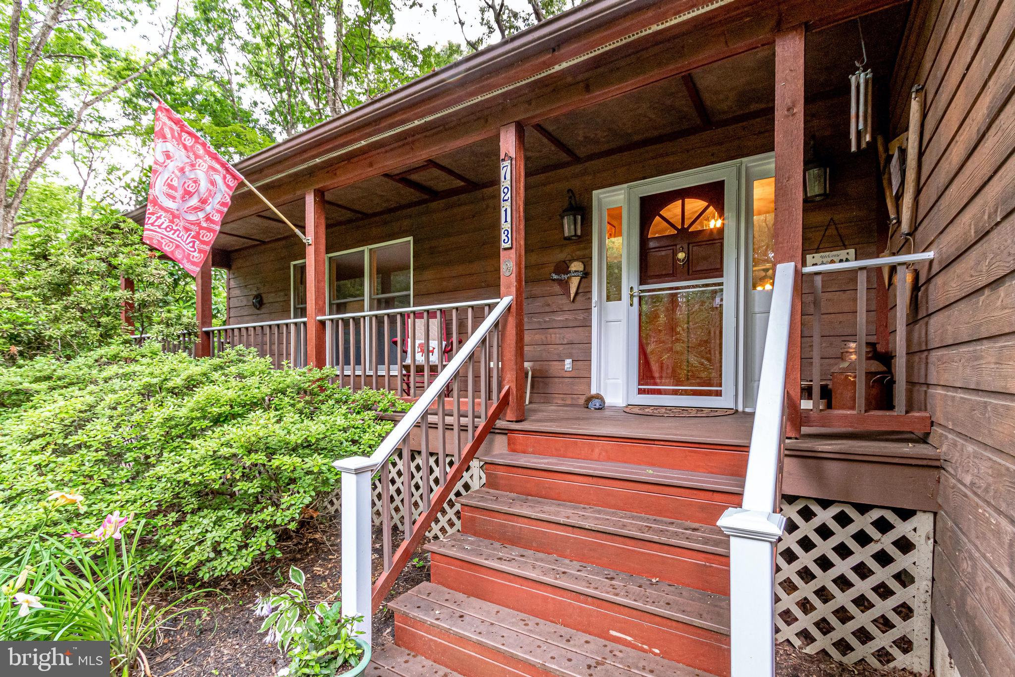 Imagine the evenings/early mornings on this porch!