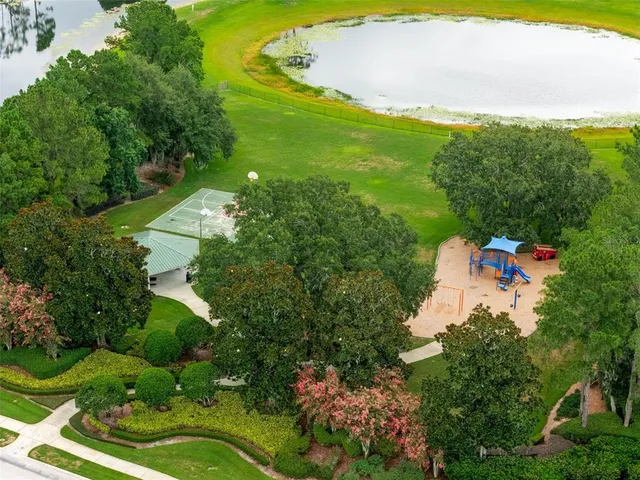 a view of a swimming pool with an outdoor space and seating area