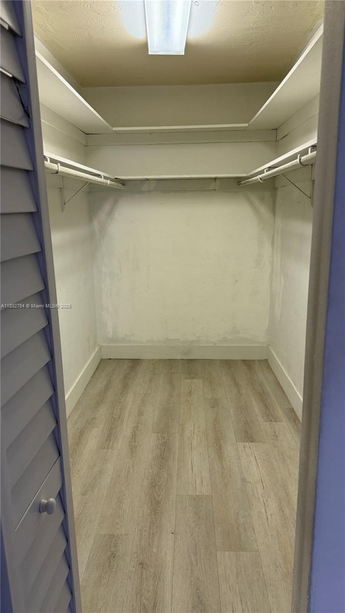 9621 Southwest 77th Avenue, Unit 108B Miami, FL 33156 - Photo 16 of 16 a view of an empty room