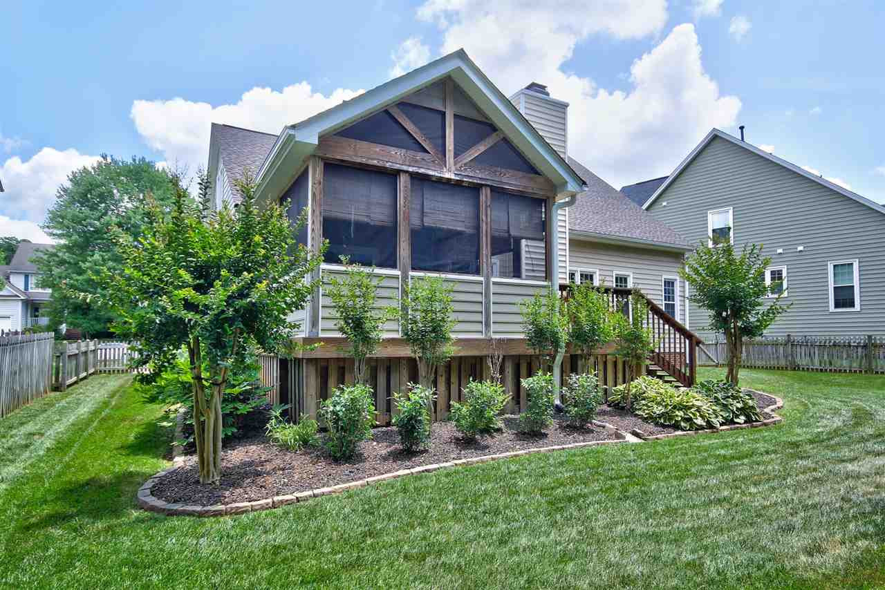 12305 Amoretto Way Raleigh, NC 27613 - Photo 27 of 30 Beautiful landscaping enhances the yard and shows you how meticulous the current owner's have kept the home. This is truly move in ready in a very friendly community. Exterior Back