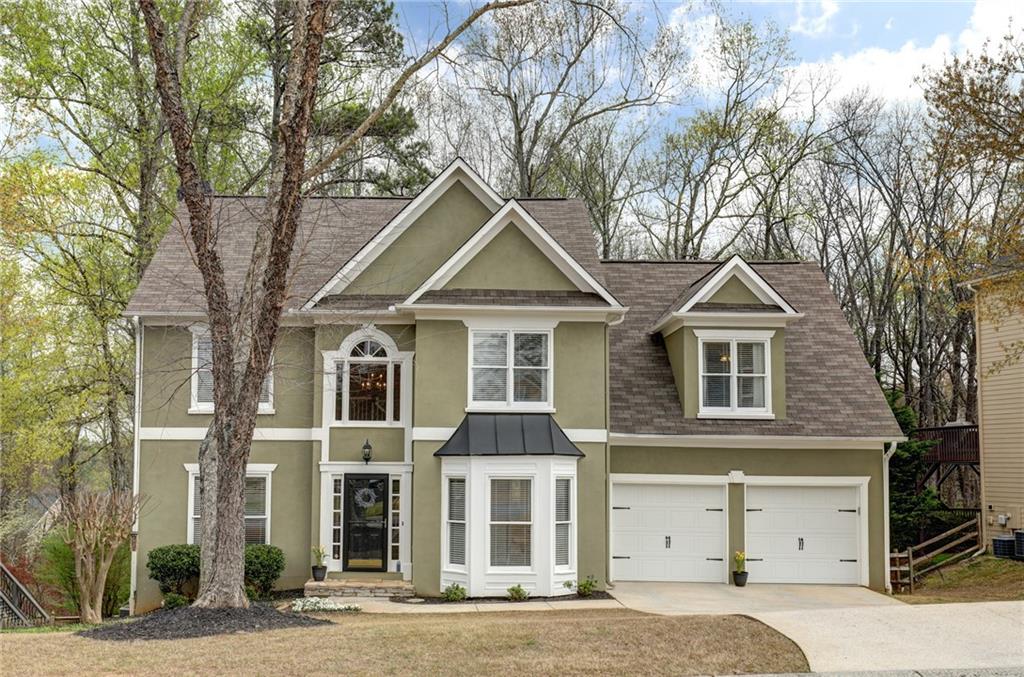 7056 Hunters Ridge Woodstock, GA 30189 - Photo 1 of 1 Welcome home to 7056 Hunters Ridge in popular Deer Run West. This incredible neighborhood is full of amenities for every age group.