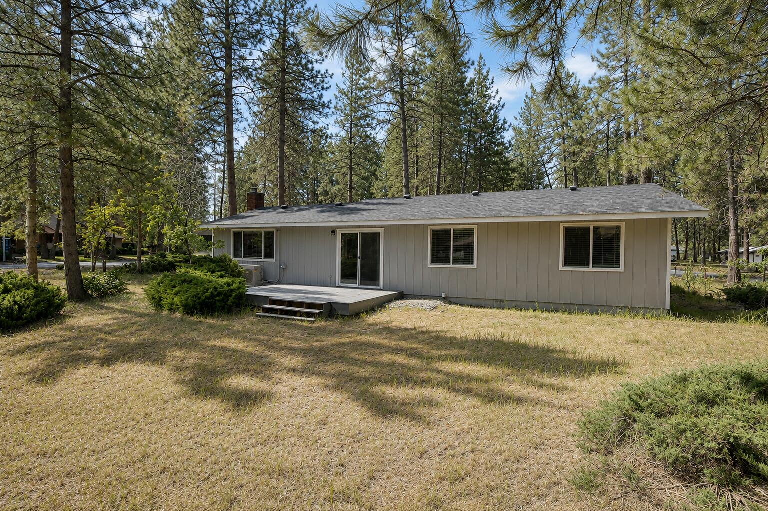 19968 Double Tree Court Bend, OR 97702 - Photo 20 of 28 front view of a house with a patio
