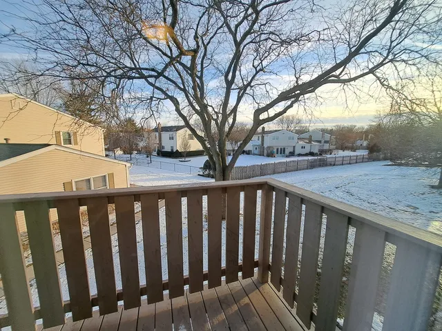 a view of a house with a large window