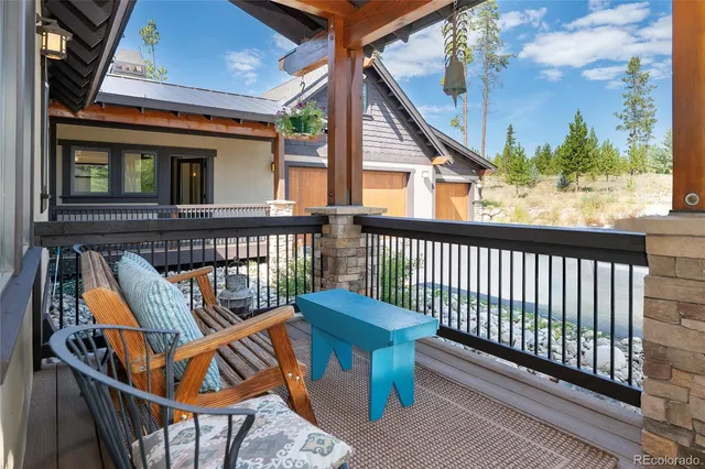 a view of a balcony with furniture