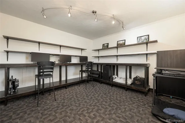 a kitchen with refrigerator and window