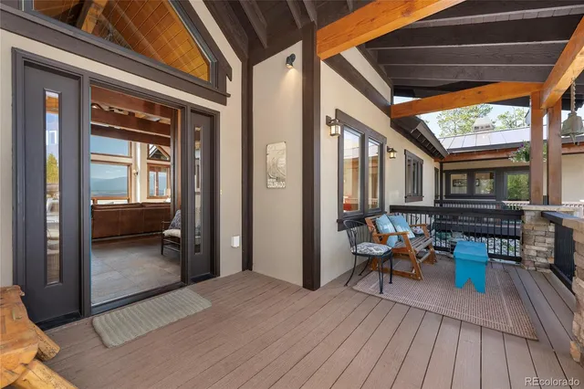 a view of a house with outdoor seating