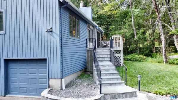 a view of a back yard of the house