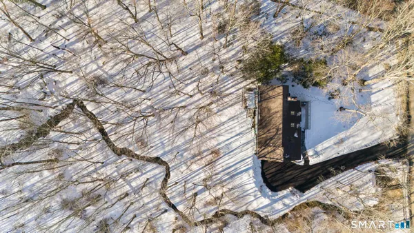 a view of a yard with an outdoor space