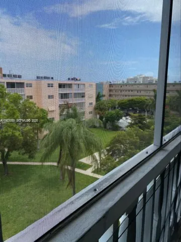 a view of a balcony with an outdoor space