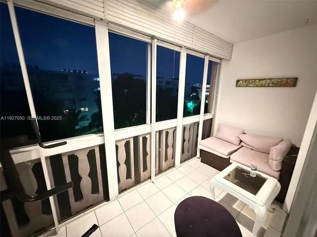 a bed room with a bed and a window