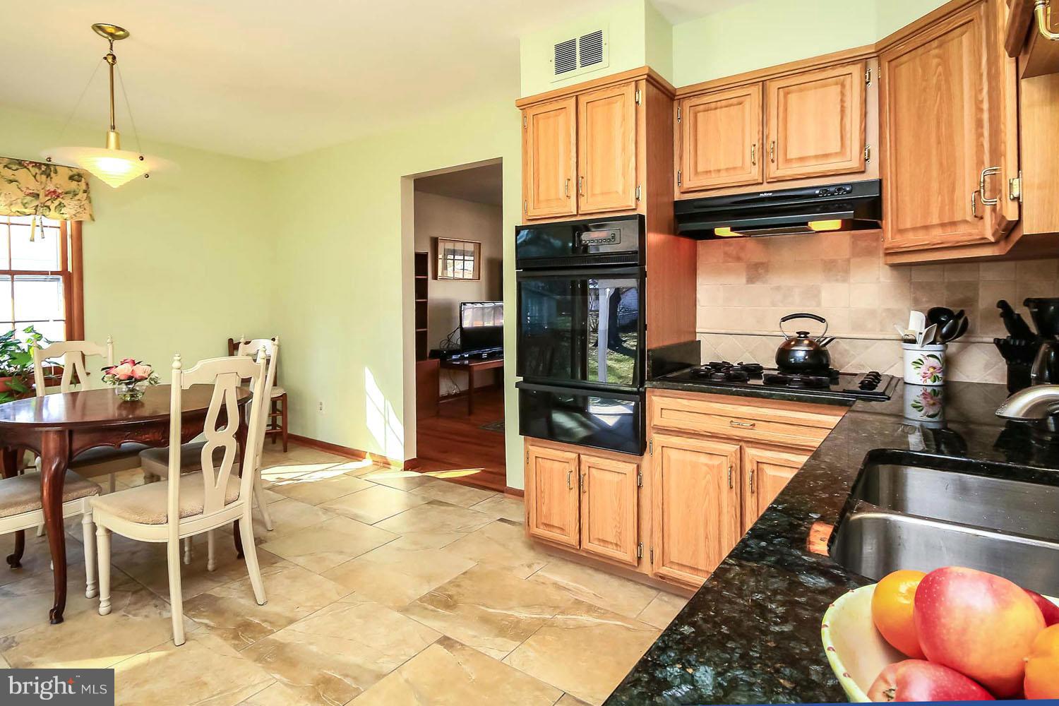 112 Brent Road Arnold, MD 21012 - Photo 11 of 30 Easy Flow into Open Dining Area and Kitchen