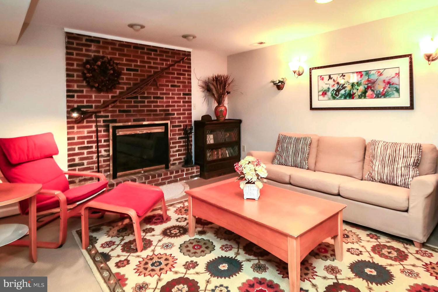 112 Brent Road Arnold, MD 21012 - Photo 17 of 30 Lower Level Family Room w/Gathering Fireplace