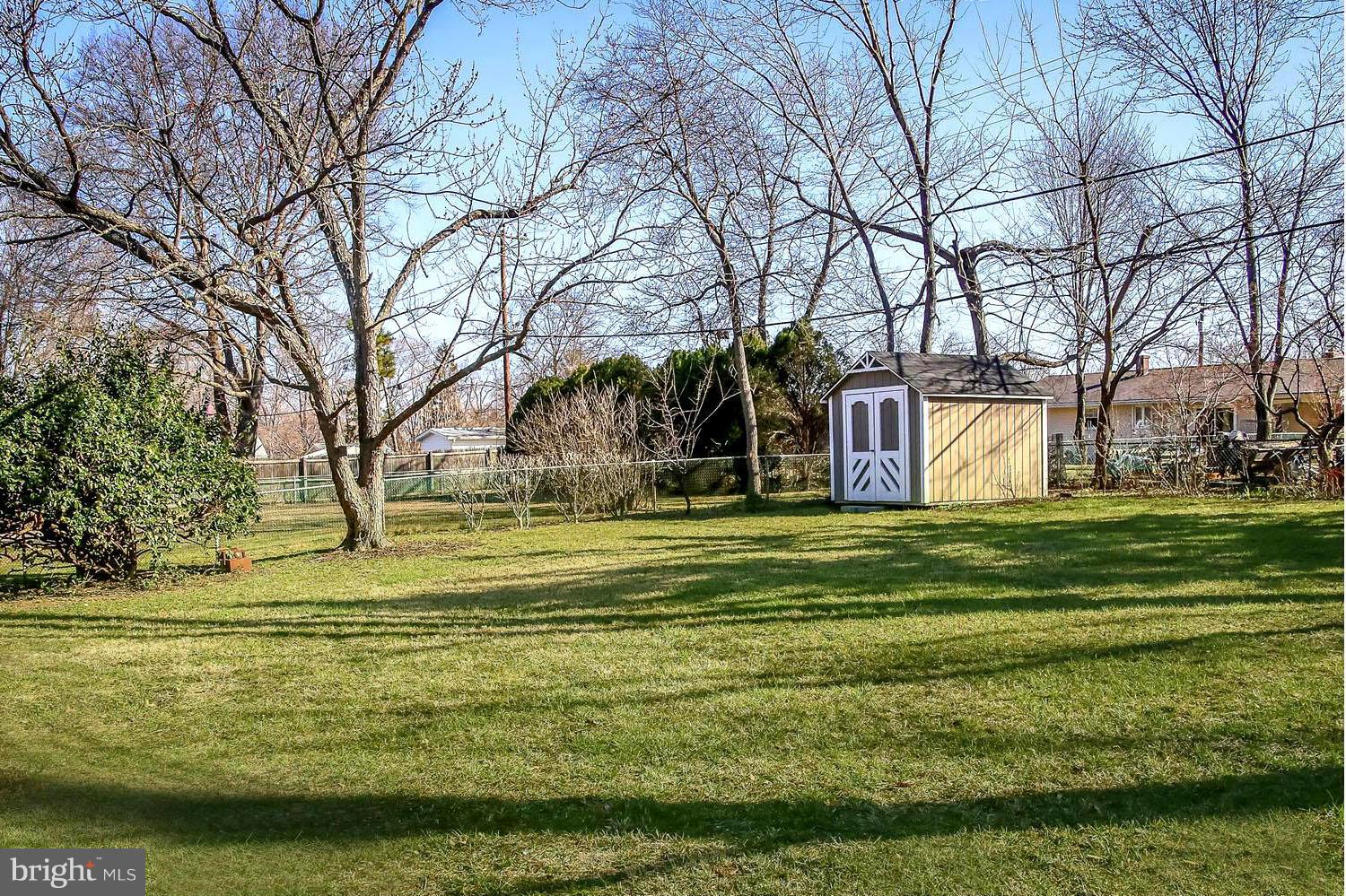 112 Brent Road Arnold, MD 21012 - Photo 6 of 30 Tree-Shaded Fenced Yard Awaiting Pets and Play