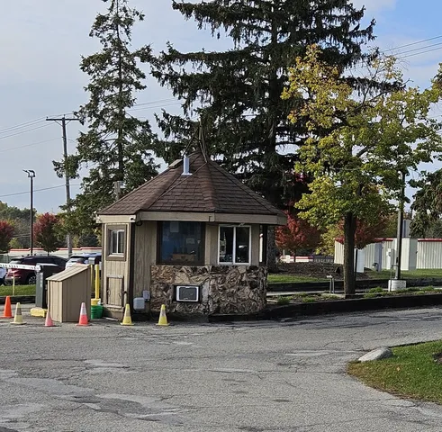 a front view of a house with garage