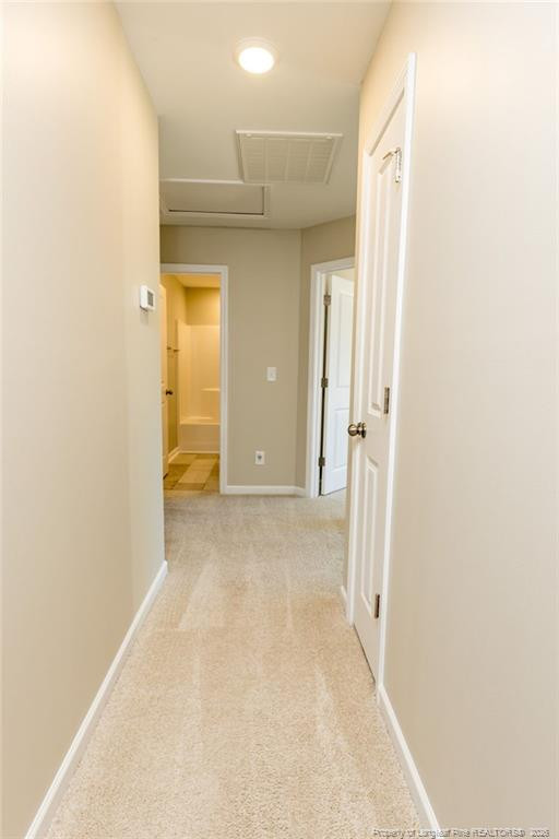 325 Ray Byrd Road Lillington, NC 27546 - Photo 13 of 26 a view of a bathroom with a glass door