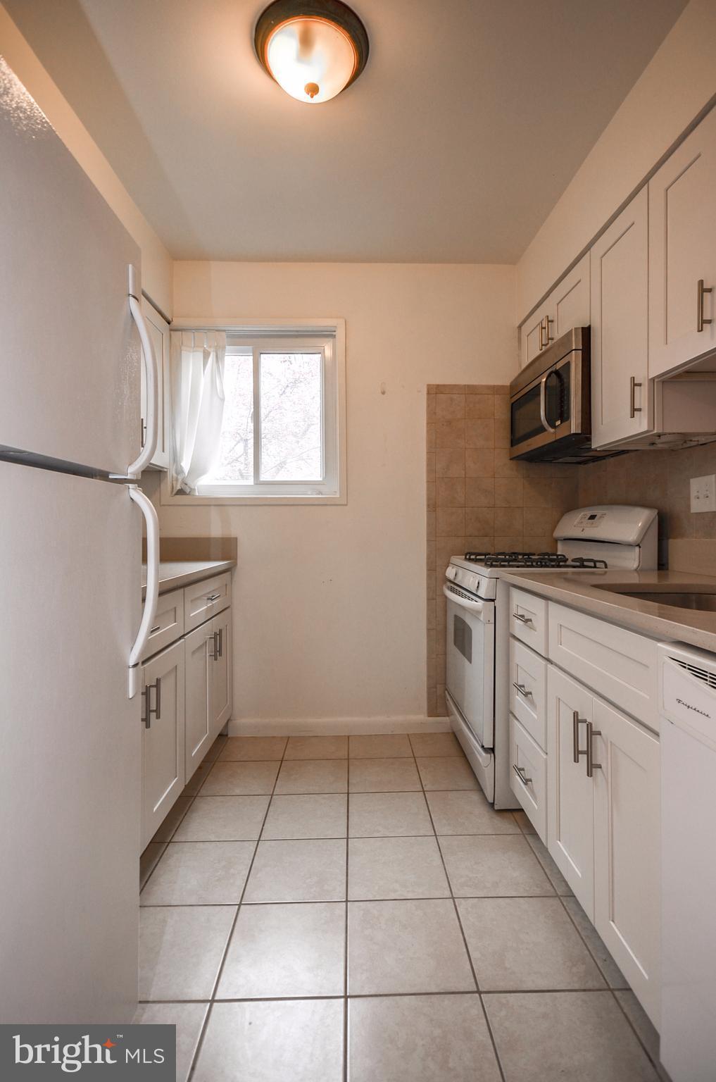 11607 Elkin Street, Unit 101 Silver Spring, MD 20902 - Photo 4 of 19 Kitchen
