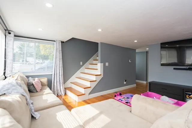 a bed room with a bed and a television