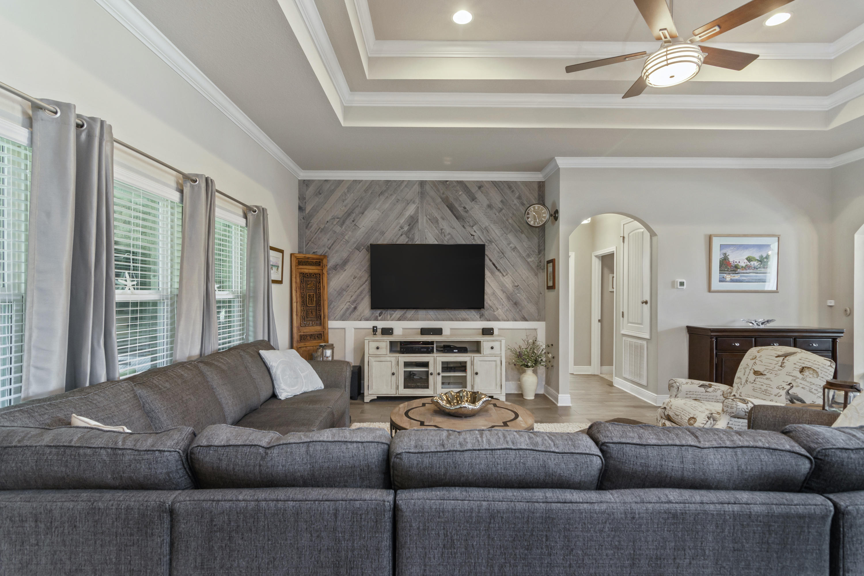 341 Lilly Bell Lane Freeport, FL 32439 - Photo 11 of 36 a living room with furniture and a flat screen tv