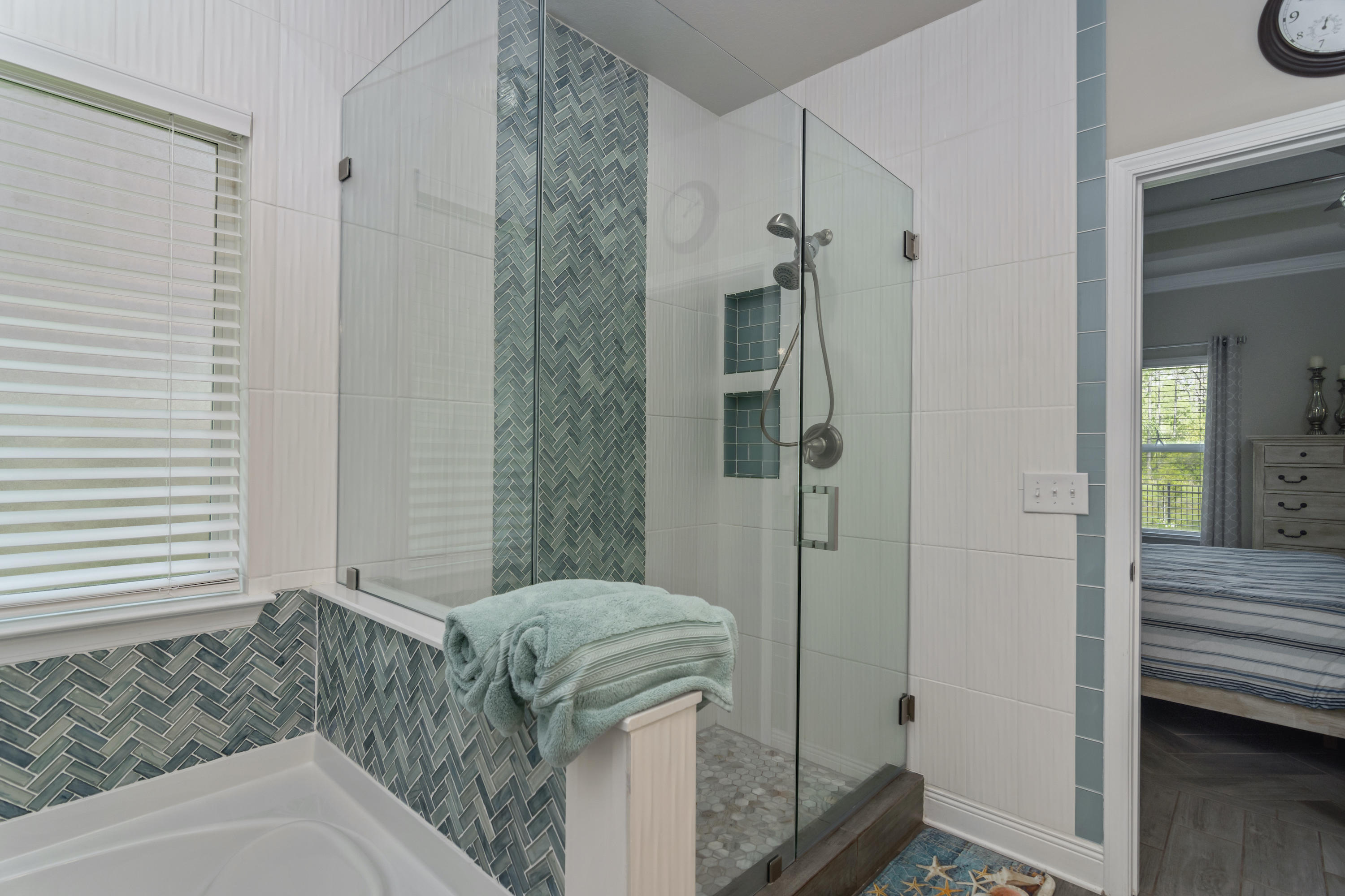 341 Lilly Bell Lane Freeport, FL 32439 - Photo 20 of 36 a bathroom with a sink a toilet and shower