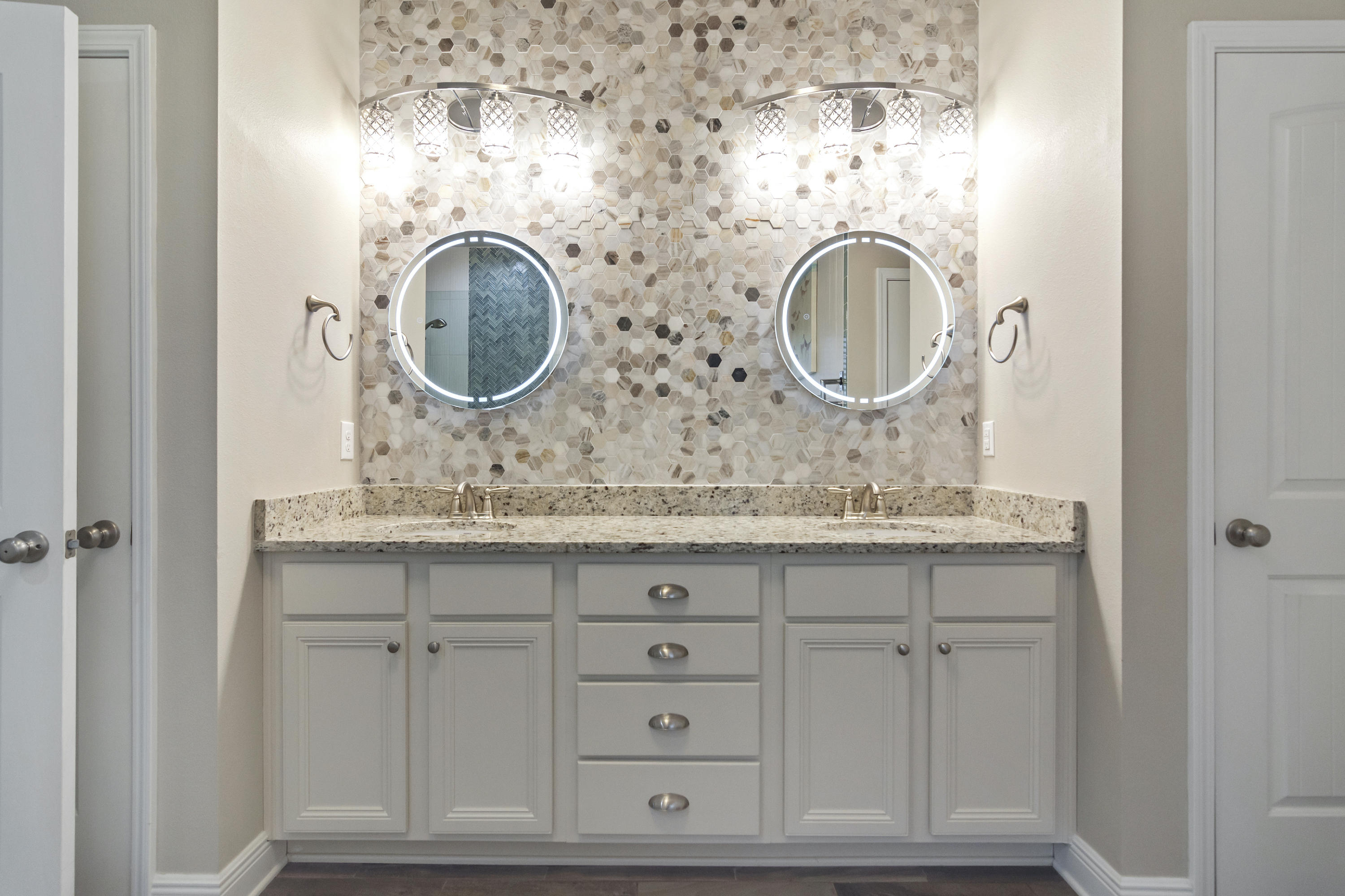 341 Lilly Bell Lane Freeport, FL 32439 - Photo 21 of 36 a bathroom with mirror and a sink