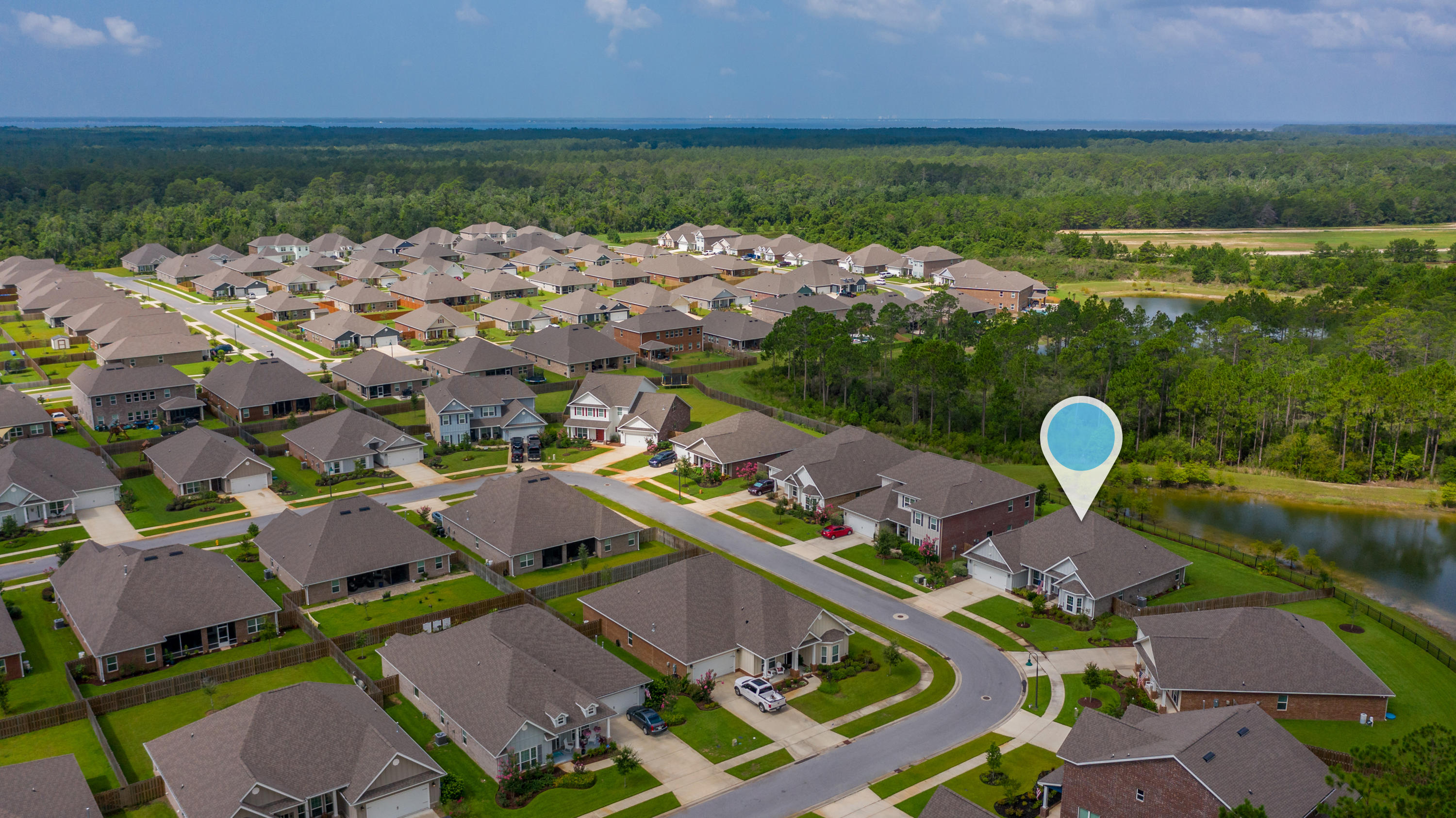 341 Lilly Bell Lane Freeport, FL 32439 - Photo 34 of 36 an aerial view of a house with outdoor space lake view and house in background