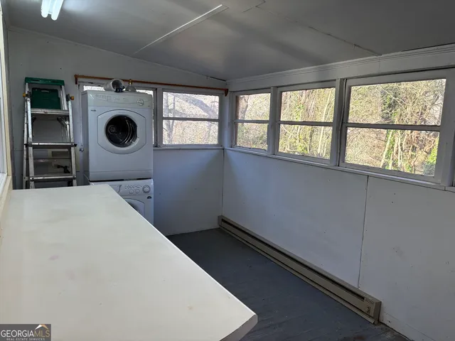 a utility room with dryer and washer