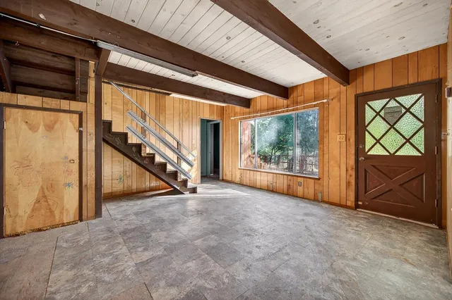 a view of front door with yard