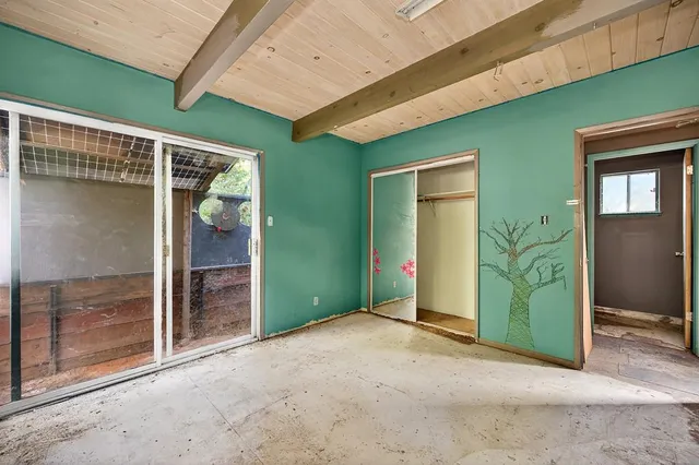 a bathroom with a toilet sink and shower
