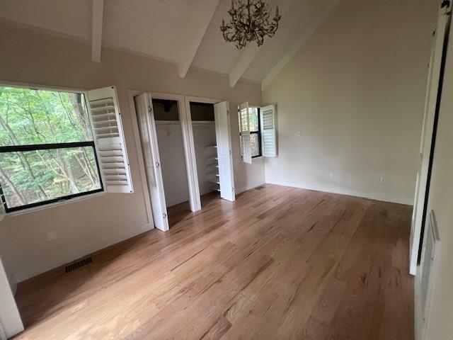 1770 Valley View Drive Jasper, GA 30143 - Photo 6 of 10 an empty room with wooden floor and windows