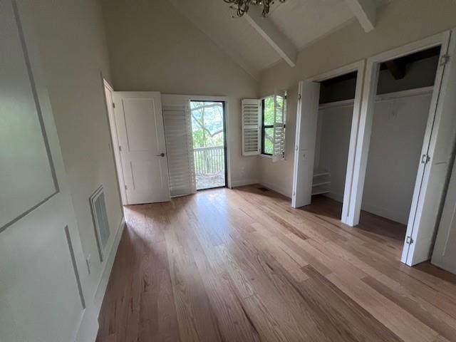 1770 Valley View Drive Jasper, GA 30143 - Photo 7 of 10 an empty room with wooden floor and windows
