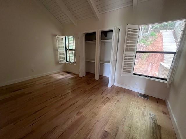 1770 Valley View Drive Jasper, GA 30143 - Photo 9 of 10 an empty room with wooden floor and windows
