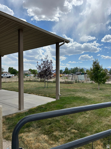 175 North 100th West Centerfield, UT 84622 - Photo 2 of 32 Back yard. Covered patio with concrete flooring