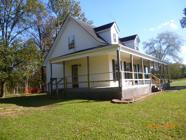 160 Haskins Chapel Road Lewisburg, TN 37091 - Photo 3 of 19 a view of a house with a yard and sitting area